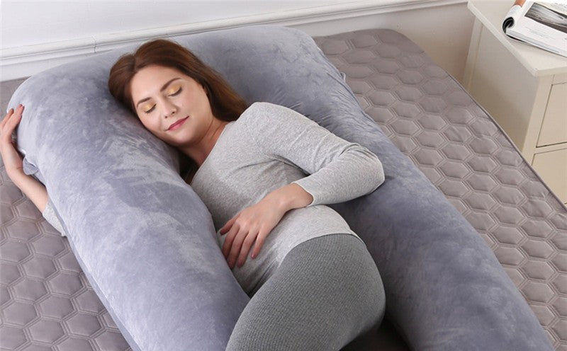 A sleeper resting on her side in bed, mid-night